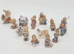Collection of Goebel Studio Hummel Christmas decorations, modelled as groups of children,