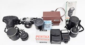 Pentax ME Super camera together with a boxed Pentax AF-200S flash, a boxed Hanimex TZ/1 flash, a