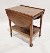 Mahogany wine table of circular form on turned pedestal support with three splayed legs, 69cm high x