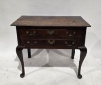 18th century oak lowboy, the rectangular top over two long drawers with brass drop loop handles