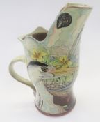 Maureen Minchin, pottery heron jug, decorated with fish, otter, swan and heron, incised mark to