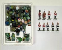 Nine Britains Limited metal painted soldiers including three Blues and Royals Troopers, four