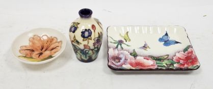 Small Moorcroft pottery vase in the Ashwood Hepatica pattern designed by Emma Bossons, printed