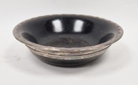 Turned wooden mazer bowl having spot hammered white metal mounts, 27cm diameter