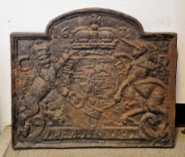 Antique cast iron fire back with relief decoration of the Royal Coat of Arms of King Charles I,