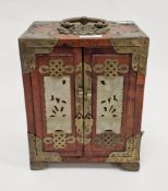 Chinese hardwood jewellery cabinet having brass metal mounts and pierced carved jade panels, the two