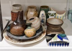Group of studio pottery and other items, including a Poole pottery freeform vase in the bamboo