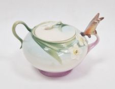 Franz porcelain sugar bowl and cover moulded with flowers with dragonfly handle, printed blue marks,