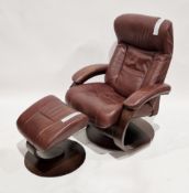 Stressless reclining armchair and matching footstool upholstered in a brown leatherette fabric,