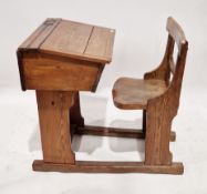 Victorian pine and elm child's combined school desk and chair, the desk with sloping hinged lid,