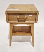 Mid-century G-Plan pale oak bedside table comprising a single drawer with oak loop handle, on square