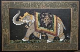 Mughal school, gouache painting of an Indian elephant within gilt painted border, framed and glazed,