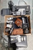 Collection of cameras and equipment including a Thagee Exa II camera, a Kodak retina automatic 1