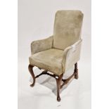 Early 20th century walnut armchair in the Queen Anne manner, upholstered in a pale fabric, on