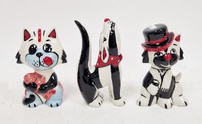 Lorna Bailey model of a dog and two models of cats, each signed in black enamel, comprising