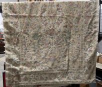 Cream ground woven rug with floral field and borders, 185cm x 120cm