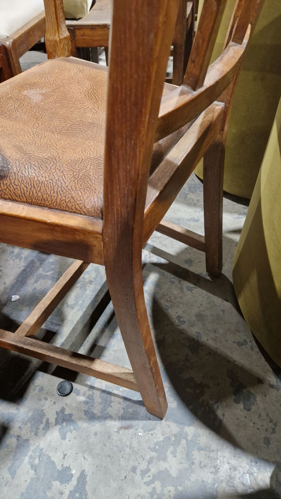 In the manner of the Cotswold School an Arts and Crafts pale oak elbow chair with lattice back, - Image 7 of 14