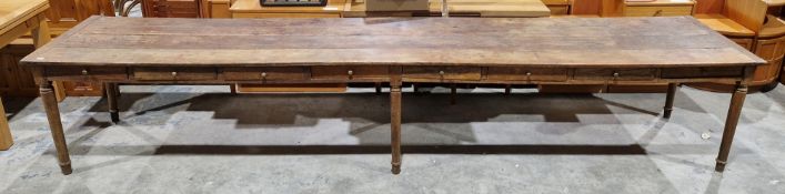 18th century oak rent table, possibly Irish, the long rectangular plank top over sixteen frieze
