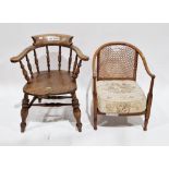 19th/early 20th century elm seated captain's-type tub chair with spindle back, saddle seat, on