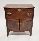 Early 19th century mahogany bowfronted nightstand comprising a drawer over a pair of panel doors
