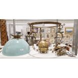 19th century brass hanging lamp with opaque blue glass domed shade, the frame with brass foliate