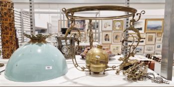 19th century brass hanging lamp with opaque blue glass domed shade, the frame with brass foliate