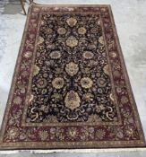 Eastern midnight blue ground rug with floral field, multiple floral borders, 275cm x 180cm