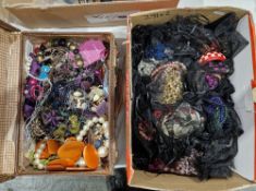 Small suitcase with a quantity of costume jewellery, mainly necklaces, together with a box of