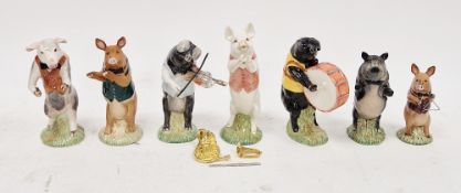Group of Beswick pottery pig musicians comprising Daniel, David, Richard, James, John, Matthew and