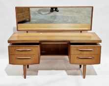 Mid-century G-Plan Fresco dressing table comprising a long rectangular mirror over four drawers with