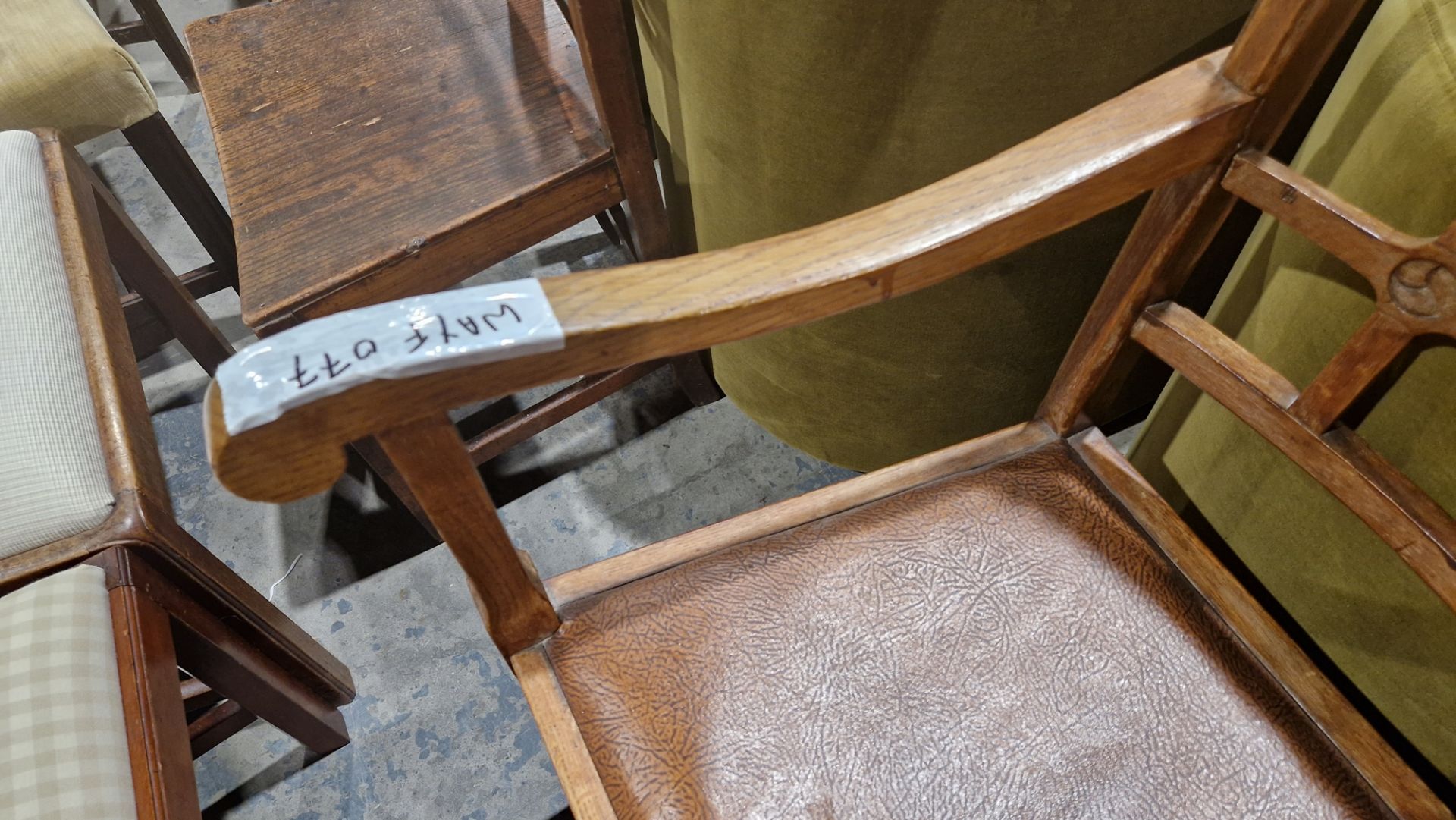 In the manner of the Cotswold School an Arts and Crafts pale oak elbow chair with lattice back, - Image 4 of 14
