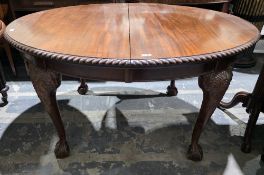 Late Victorian mahogany oval wind-out extending dining room table in the Chippendale manner, the top