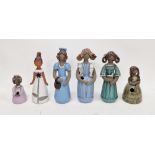 Six Elbogen (Sweden) stoneware figures of girls, each inscribed Elbogen/Handmade, various painted