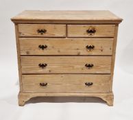 George III pine chest, the rectangular top over two short and three long graduated drawers with