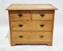 Late 19th century pine chest comprising two short and two long graduated drawers with brass drop