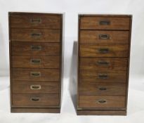 Pair of mid-century mahogany campaign-style chests of seven short drawers by Drexel, brass-mounted