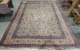 Large Tabriz cream ground carpet with hand-knotted allover floral pattern field, multiple herati and