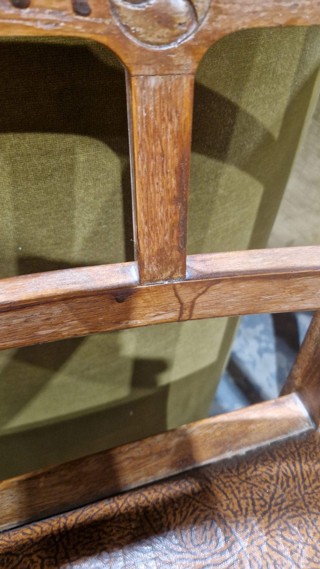 In the manner of the Cotswold School an Arts and Crafts pale oak elbow chair with lattice back, - Image 14 of 14