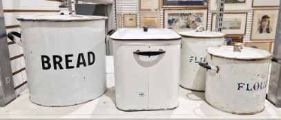 Four early to mid-20th century enamel storage bins with lids including Bread, 34cm high, two