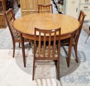 Mid-century G-Plan Fresco teak dining table and four chairs, the dining table of circular form