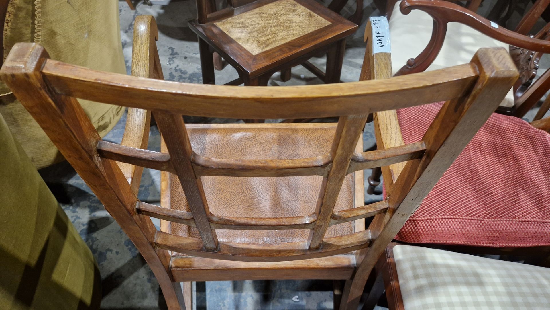 In the manner of the Cotswold School an Arts and Crafts pale oak elbow chair with lattice back, - Image 12 of 14