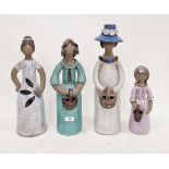 Four Elbogen (Sweden) stoneware figures of women and girls, each inscribed Elbogen/Handmade with