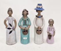 Four Elbogen (Sweden) stoneware figures of women and girls, each inscribed Elbogen/Handmade with