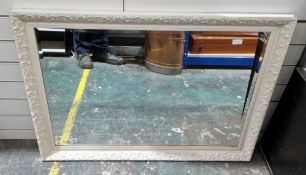 Rectangular bevelled edge wall mirror in a white foliate scroll moulded frame, 101cm x 71cm