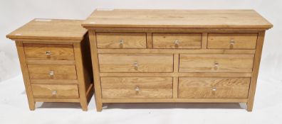 Two contemporary pale oak chests, the first chest comprising three short drawers over two banks of