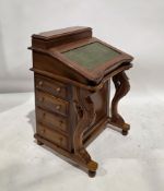 Davenport in the Victorian manner, the overstructure with hinged lidded compartment, over a