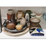 Group of studio pottery and other items, including a Poole pottery freeform vase in the bamboo