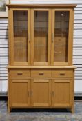 Morris Furniture Company of Scotland modern light oak side cabinet, the upper section with three