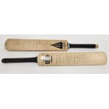 Two autographed cricket bats including a Duncan Fearnley bat signed by the England cricket team (