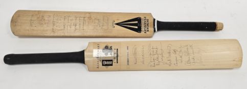 Two autographed cricket bats including a Duncan Fearnley bat signed by the England cricket team (
